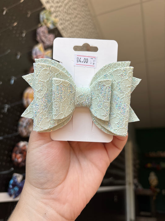 Light blue lace- faux leather bows