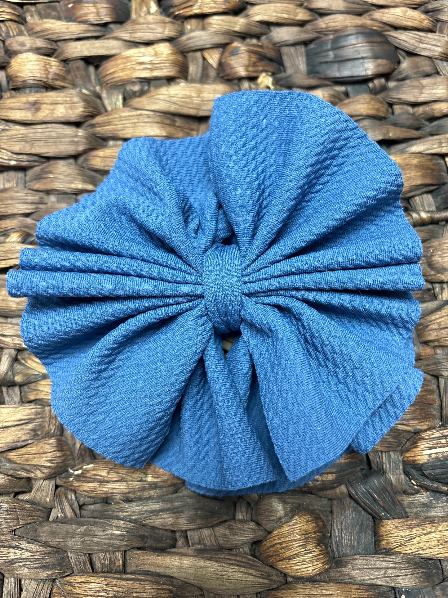 Blue denim shredded bow