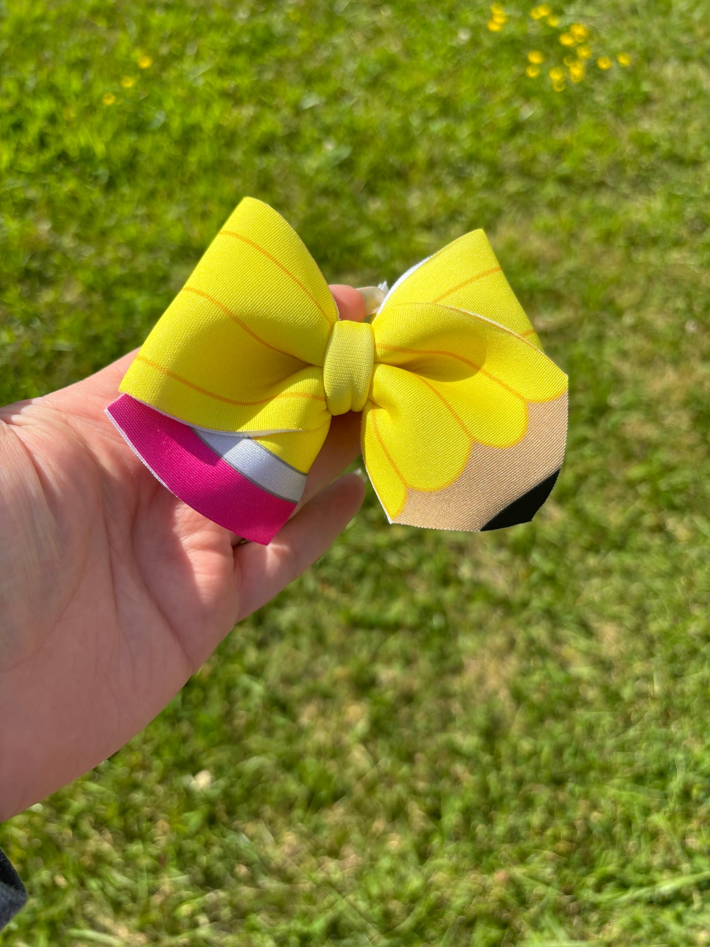 Yellow pencil clip bow