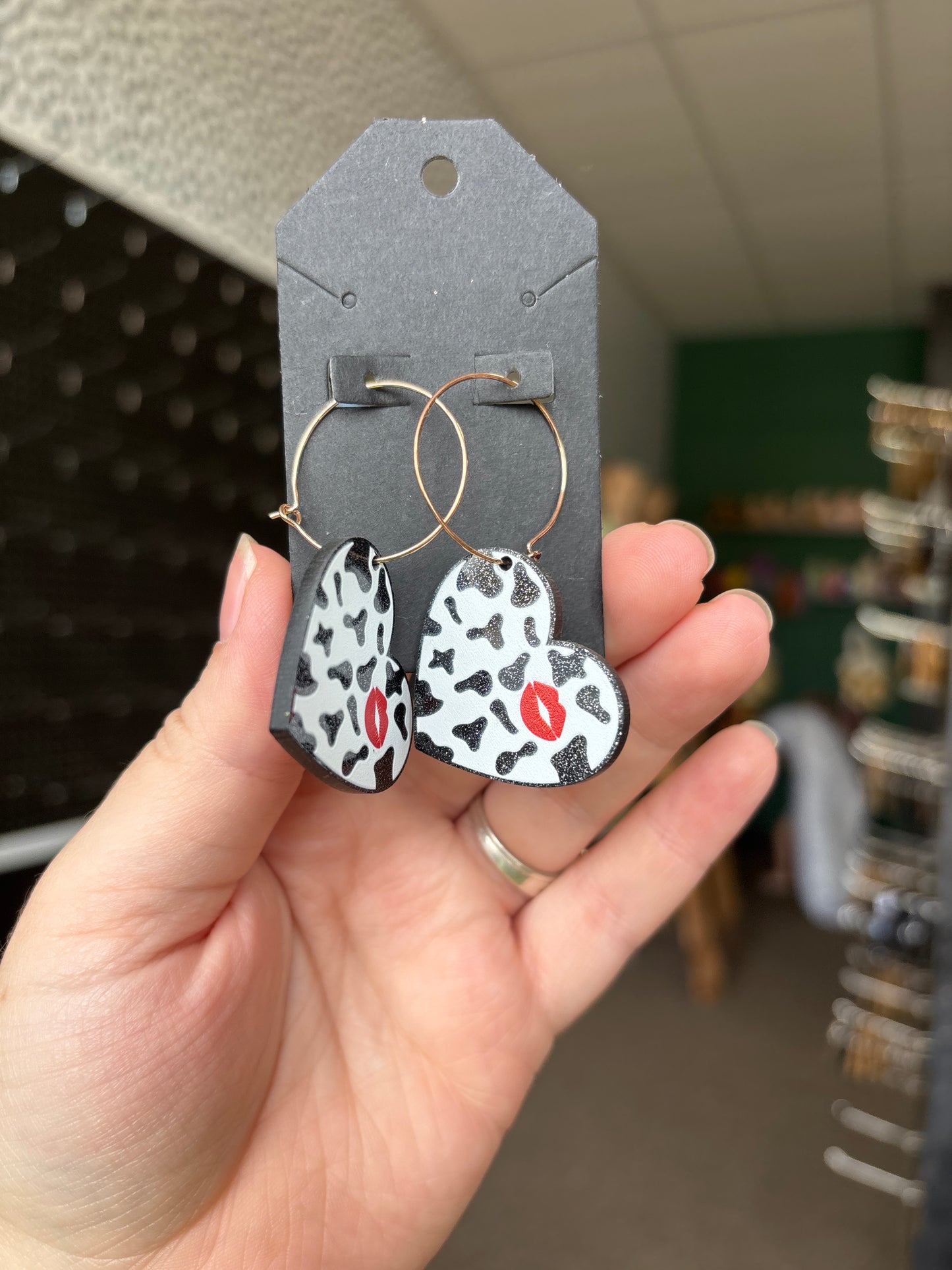 Cow print heart hoop earrings