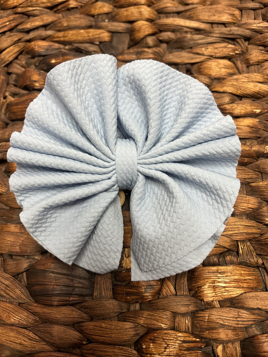 Light blue shredded bow