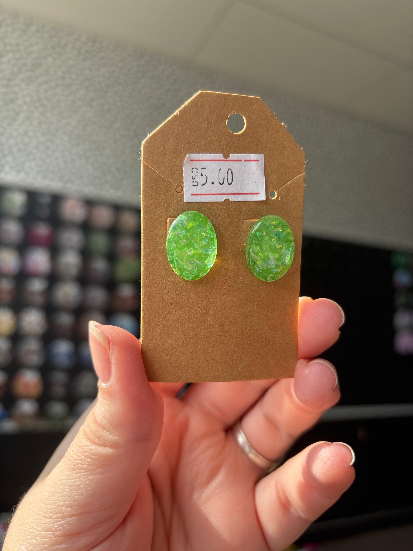 Green egg shaped earrings