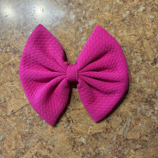 Neon magenta 4inch regular clip bow